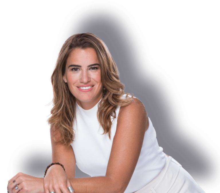 Dr. Nicole LePera, The Holistic Psychologist, leaning forward and smiling