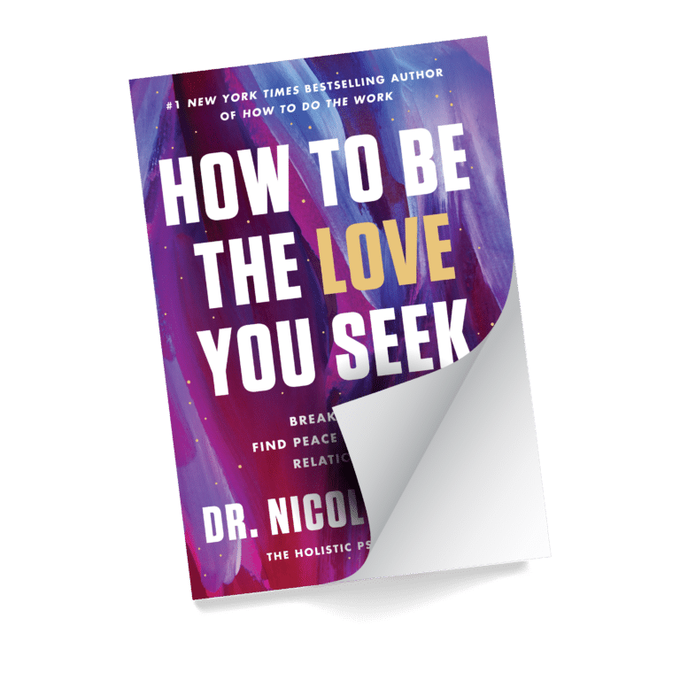 The How to Be the Love You Seek workbook, its cover curling open at one corner